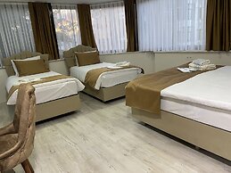 Atam Suites & Apart
