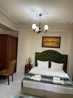 Atam Suites & Apart