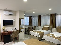 Atam Suites & Apart