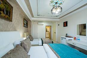 Atam Suites & Apart