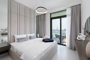 Modern 2BR Emaar Beachfront w Pvt Beach Access