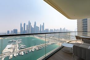 Modern 2BR Emaar Beachfront w Pvt Beach Access