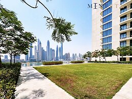 Modern 2BR Emaar Beachfront w Pvt Beach Access