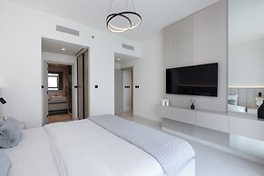 Modern 2BR Emaar Beachfront w Pvt Beach Access