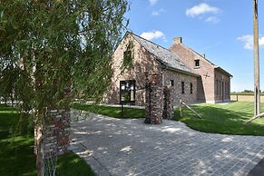 Spacious Holiday Home With Pond in Poperinge