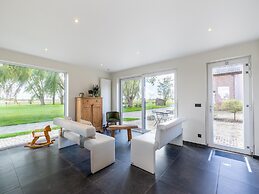 Spacious Holiday Home With Pond in Poperinge