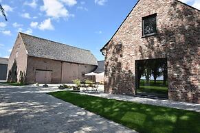 Spacious Holiday Home With Pond in Poperinge