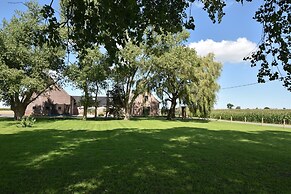 Spacious Holiday Home With Pond in Poperinge