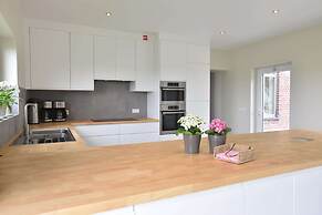 Spacious Holiday Home With Pond in Poperinge