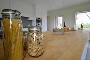 Spacious Holiday Home With Pond in Poperinge