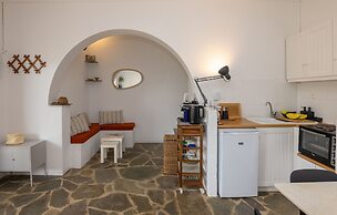 By The Stone Tinos
