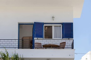 Summer Grace Tinos