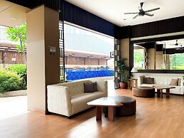 Modern Look and Restful Studio at Azalea Suites Apartment
