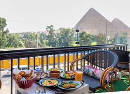 Maria Pyramids House