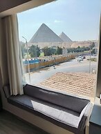 Maria Pyramids House