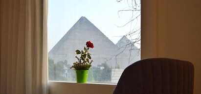 Maria Pyramids House