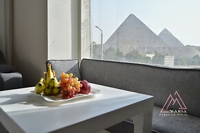 Maria Pyramids House