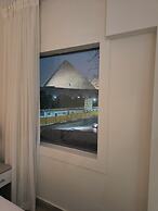 Maria Pyramids House