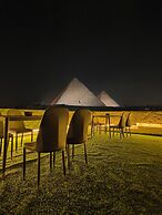 Maria Pyramids House