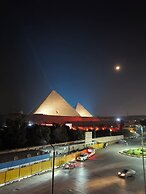 Maria Pyramids House