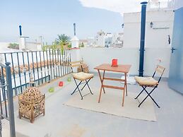 Cozy Flat With Rooftop Views