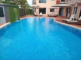 Hibiscus Suites And Residences