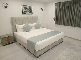 Hibiscus Suites And Residences