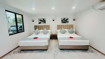 Hibiscus Suites And Residences