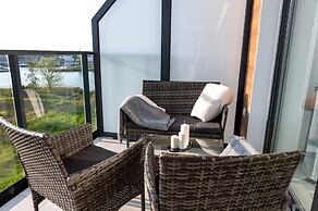 Apartment Overlooking the River, Sauna, Dziwnow