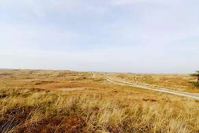 Inviting Dune Chalet in Hollum Near Golf Course