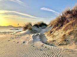 Inviting Dune Chalet in Hollum Near Golf Course