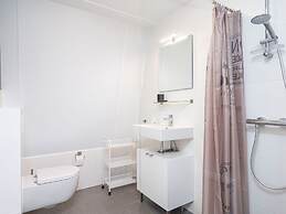 Bungalow With an Outdoor Fireplace by Water