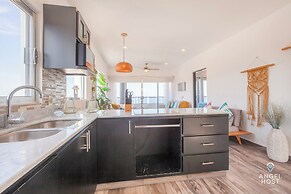 Condos Near Malecon Bay & Sunset Views