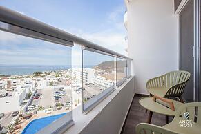 Condos Near Malecon Bay & Sunset Views