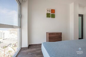 Condos Near Malecon Bay & Sunset Views