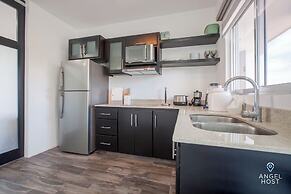 Condos Near Malecon Bay & Sunset Views