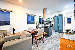 Condos Near Malecon Bay & Sunset Views