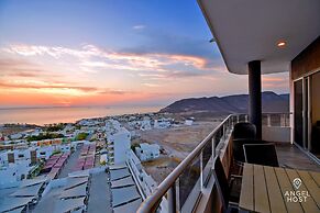 Condos Near Malecon Bay & Sunset Views