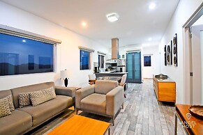 Condos Near Malecon Bay & Sunset Views