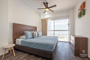 Condos Near Malecon Bay & Sunset Views
