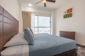Condos Near Malecon Bay & Sunset Views