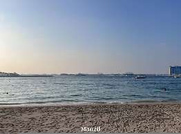 Modern 2BR w Direct Beach Access Emaar Beachfront