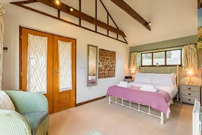 Host Stay Woodfalls Barn
