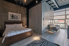 The Striped Loft Modern Elegance in a Centric Location
