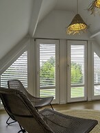 A Charming Holiday Home With a Swimming Pool