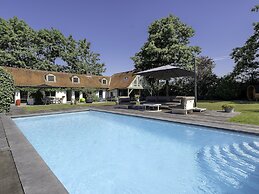 A Charming Holiday Home With a Swimming Pool