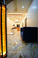 Om Palace Inn