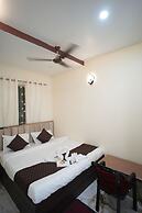 Om Palace Inn