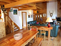 Chalet Nestled in Mountains and Garden