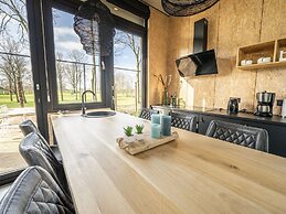 Modern Chalet by the River Maas